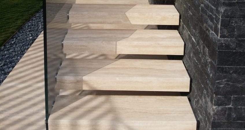 Natural stone staircases in interiors and exteriors  