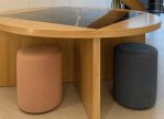 Round wooden table with black marble inlay