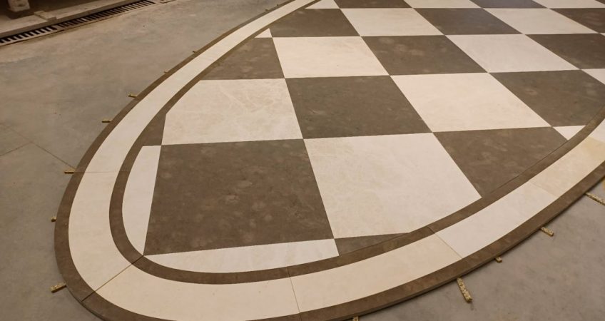 Oval marble floor medallion for a large living room floor  